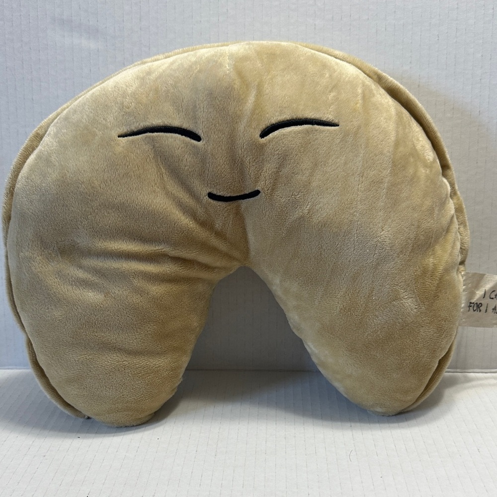 Six Flags Tan Plush Toy